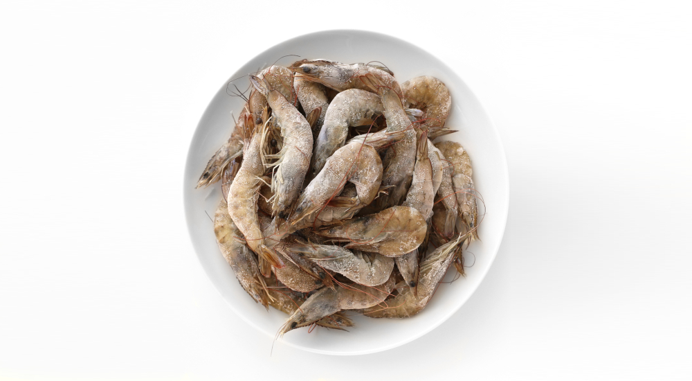 cocer langostinos congelados